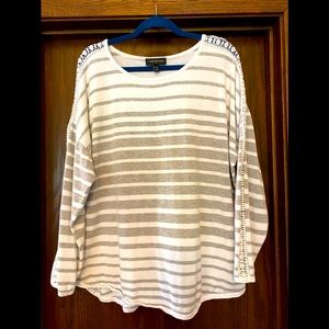 Grey and white sweater with sleeve detail